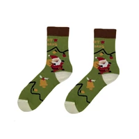 Kép 1/4 - Télapó puttonnyal vidám zokni